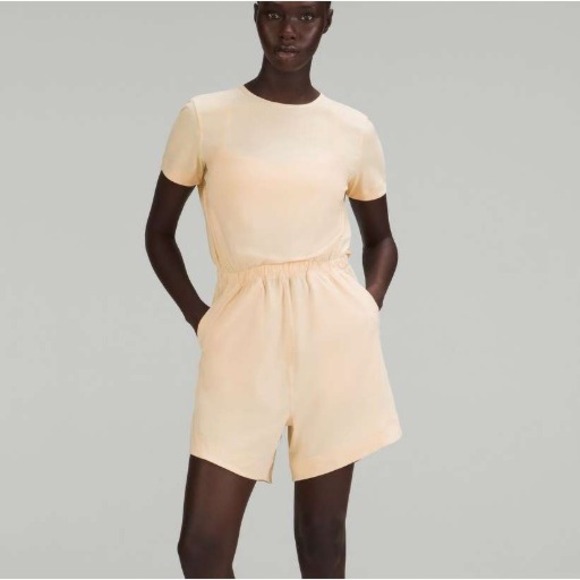 lululemon athletica Pants - Lululemon Lightweight High-Neck‎ Romper in Prosecco sz 8